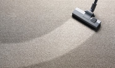 Carpet cleaning by vaccum cleaner | All Floors Design Centre