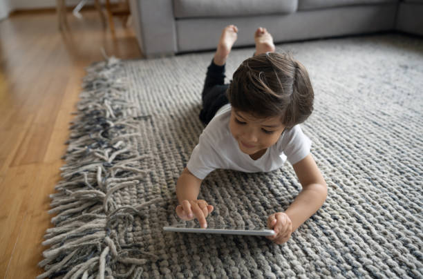 Girl lying on rug | All Floors Design Centre