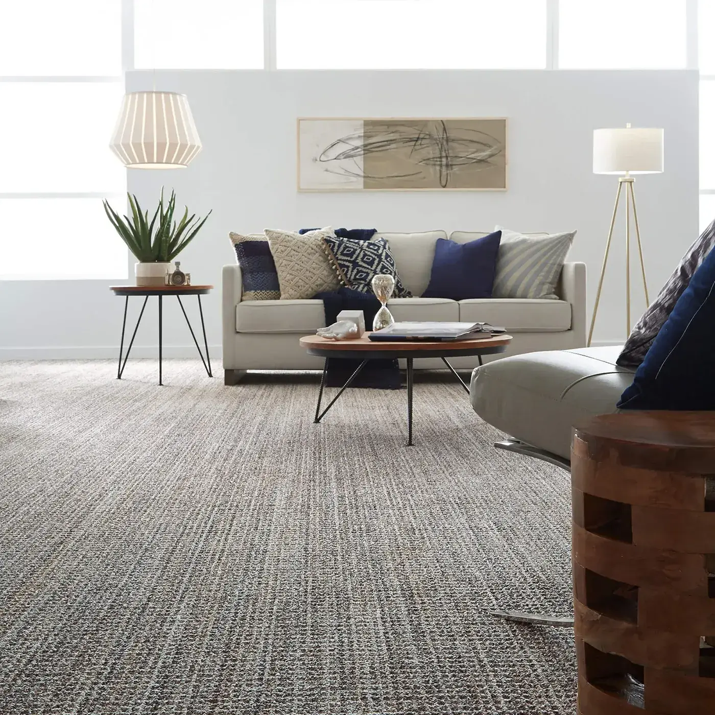 SUNDANCE-ZZ039-JURA-GREY-00525-V Textured gray Shaw Floors carpet in a modern living room | All Floors Design Centre